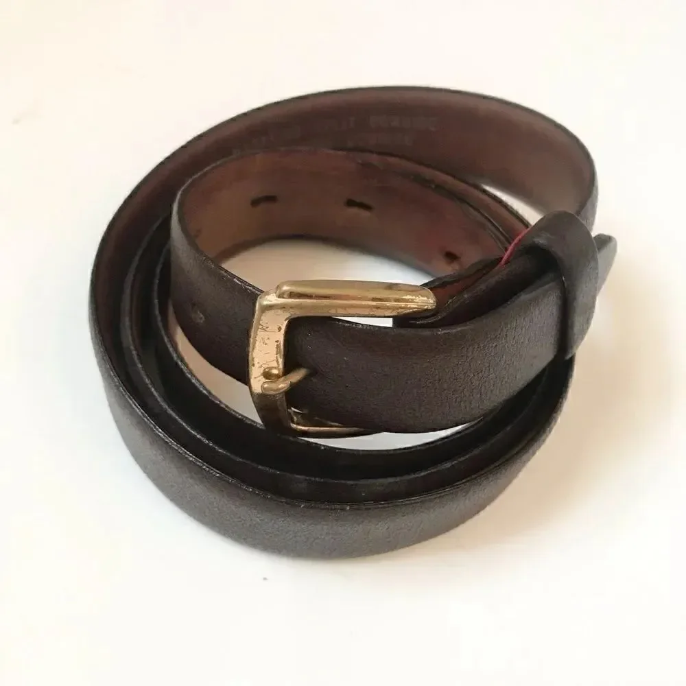 Brown leather belt with brass buckle